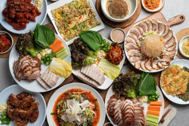 Korean food, jokbal, oriental medicine, pork, boiled pork, cold vegetables, maeyang, tray, noodles, mini, green onion pancake, mung bean pancake, red pepper pancake, side dish, salted shrimp clipart
