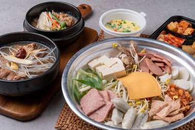 Korean food, budae jjigae, galbitang, earthen pot, bulgogi, pork belly, grilled, side dishes, kimchi, cucumbers, potatoes, vegetables clipart