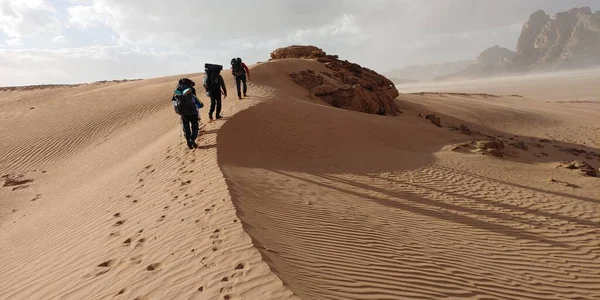 stock image Jordan Trail passes through the beautiful Dunes of Wadi Rum.In these places there are many campsites where tourists can relax after a hard day.