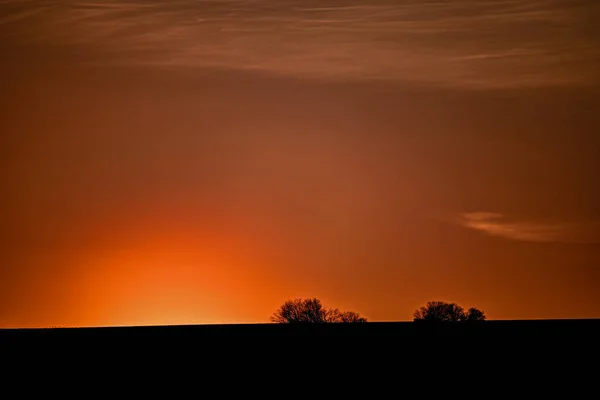 stock image sunset over the field