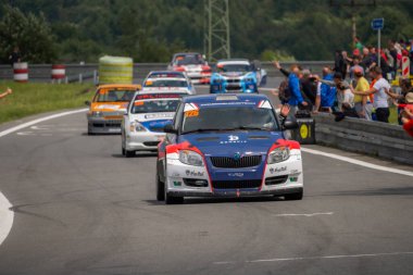 Czechia, Sternberk, 2024 / 06 / 02 - Hill climb racing, racing cars, Porsche, racing specials, People at the track, fans clipart