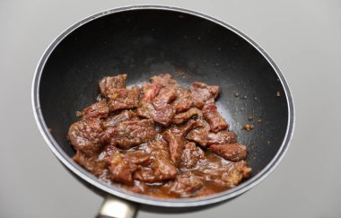 beef stew in a frying pan
