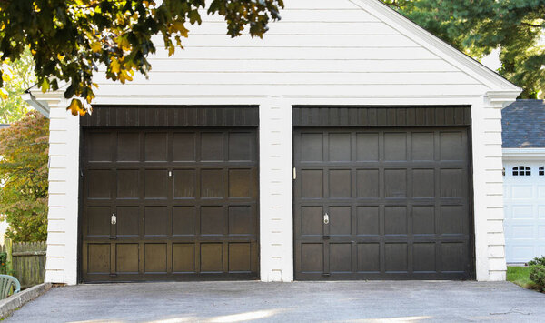 white garage with a garage