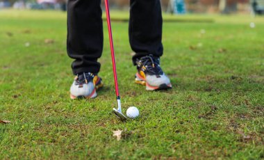 Golfçüyle golf topu