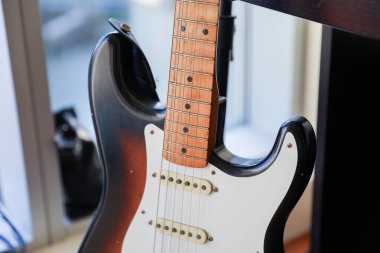 electric guitar on the wooden table.