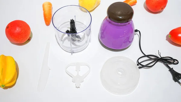 stock image The Multifunctional Purple Mini Capsule Blender is a compact and versatile kitchen appliance that offers convenience and efficiency in food preparation.