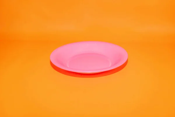 The Pink Plastic Plate is the perfect dining companion for adding a vibrant touch to your meals