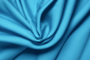 silk blue fabric, satin, luxury waves. abstract background