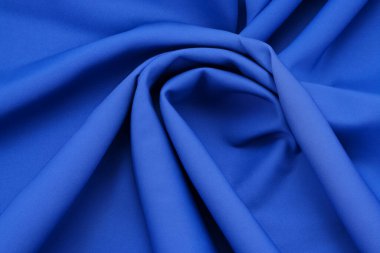 blue silk fabric background. abstract wavy background.