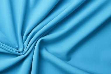 background texture pattern, fabric blue silk. a luxurious silk has smooth smooth soft satin and luxurious silk. this a luxurious twisted and a beautiful silk