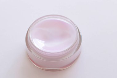 Beyaz arkaplanda kozmetik kavanoz, üst görünüm