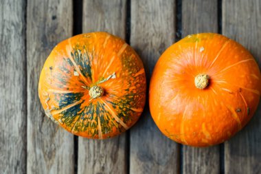 pumpkin on the old wooden background.