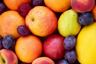 Metnin için kopyalama alanı olan taze meyve arkaplanı.