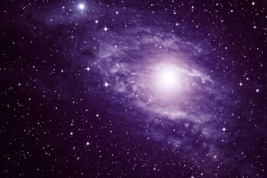 Uzak bir galaksideki yıldızlar, toz ve gaz bulutsusu. Bu görüntünün unsurları Nasa tarafından desteklenmektedir