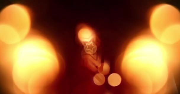 圣诞快乐 五彩斑斓的光泄漏与旋转的金光闪闪的背景 Bokeh效应 节日活动 圣诞节 Diwali 庆典等 — 图库视频影像