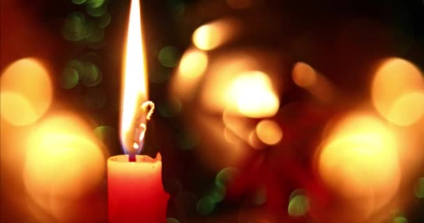 Wesołych Świąt Piękna Świeca Świeca Efekt Bokeh Tła Światła Świąteczne — Wideo stockowe