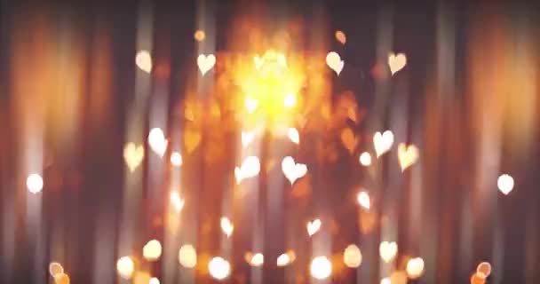 ブラックバックにボケ効果のある輝く心臓 ロマンチックな抽象的な動きの背景 バレンタインデー フェスティバルイベント ウェディング コンセティ クリスマス ディワリ お祝い — ストック動画