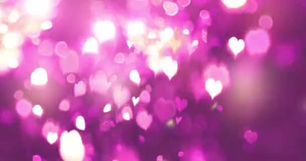 Rosa Farbe Liebe Herz Glühend Mit Bokeh Effekt Auf Schwarzem — Stockvideo