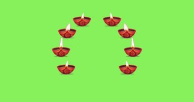 Diya yağı lambası yeşil ekranda dönüyor. Tatil, Hindu Festivali, Diwali Kutlaması, Hareket Animasyonu.