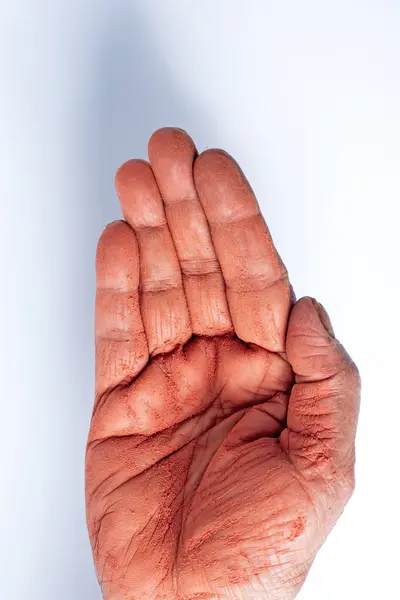 人的手的特写与全息粉末手在白色背景隔离 顶部视图 图库图片