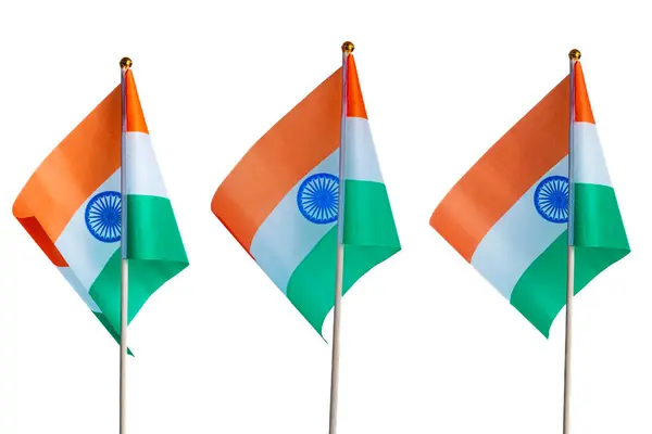 stock image Three Indian flags waving on poles against a plain background. closeup