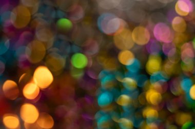 Pürüzsüz daireleri olan renkli soyut bokeh arkaplan. Şenlikli ve yaratıcı tasarımlar için mükemmel..