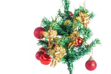 A festive Christmas tree adorned with gold angel ornaments and red baubles on a white background. Ideal for holiday decor, Christmas greeting cards designs. clipart