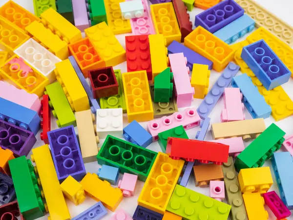 stock image Colorful Plastic toy blocks isolated on white background.