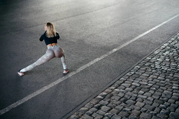 Strong Sportswoman Training Clothes Warming Doing Stretch Exercises Street Summer — Stock fotografie