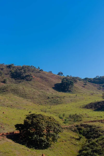 stock image a beautiful shot of hills under the blue sky 