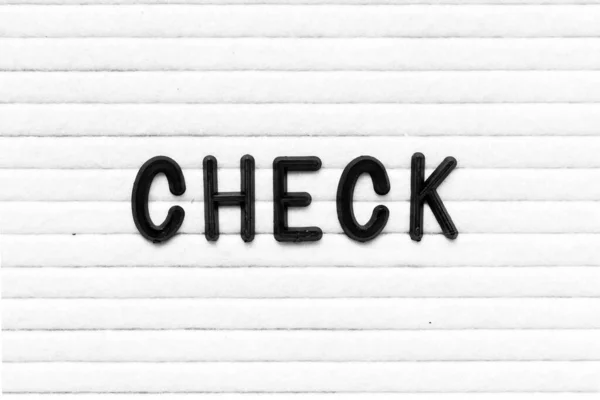 黒文字で単語チェック上のホワイトフェルトボードの背景 — ストック写真