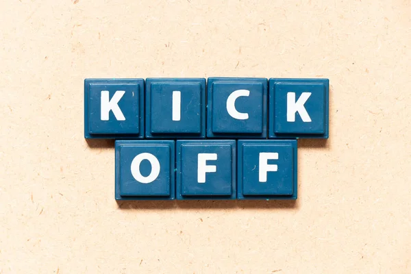 stock image Tile letter in english word kick off on wood background