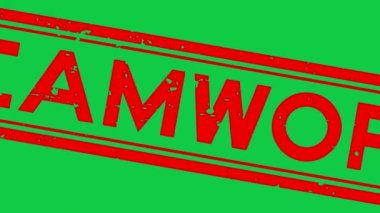 Grunge kırmızı takım çalışması kelime kare kauçuk mühür yeşil arka planda yakınlaştır