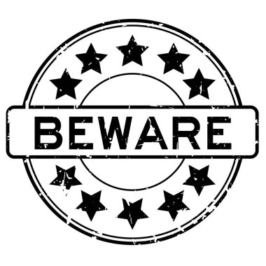 Grunge siyah kelime dikkat yıldız simgesi yuvarlak lastik mühür beyaz arka planda