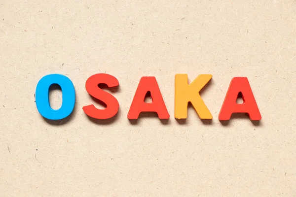 Huruf Alfabet Warna Dalam Kata Osaka Pada Latar Belakang Kayu — Stok Foto
