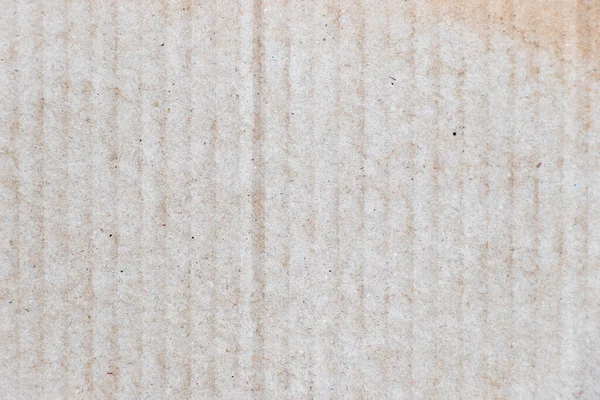 Water stained on brown corrugated packaging material background with copy space, used as wallpaper, decoration, design element, layer effect