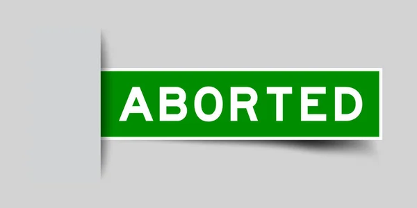 Inserito Adesivo Etichetta Colore Verde Con Parola Abortita Sfondo Grigio — Vettoriale Stock
