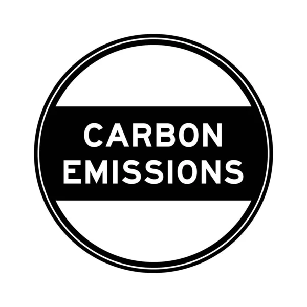 stock vector Black color round seal sticker in word carbon emissions on white background