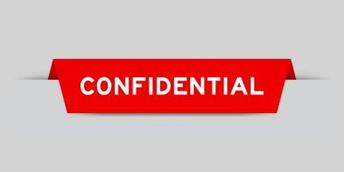 Red color inserted label with word confidential on gray background