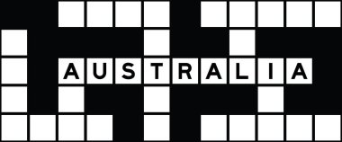 Alphabet letter in word australia on crossword puzzle background