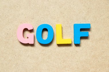Color alphabet letter in word golf on wood background