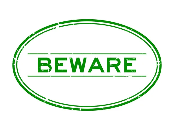 Grunge Green Beware Word Oval Rubber Seal Stamp White Background — Stock Vector