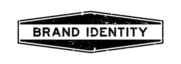 黒のブランドアイデンティティ単語六角形のゴムシールスタンプ白の背景に — ストックベクタ