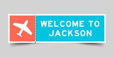 Uçak ikonlu turuncu ve mavi renkli bilet. Gri arka plandaki Jackson 'a hoş geldiniz.