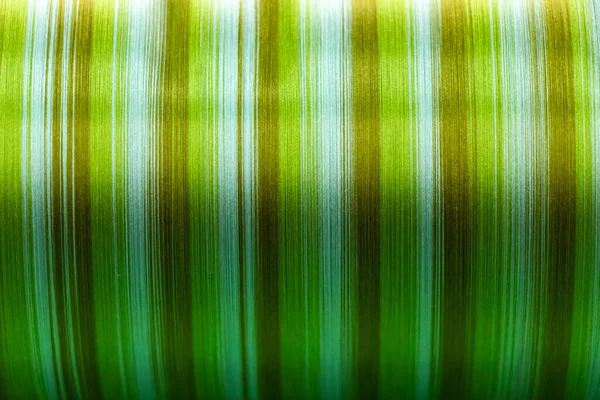 线程纹理背景绿色的闭合 集中在图片的中心 — 图库照片