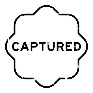 Grunge siyah kelime yakaladı Beyaz arka planda lastik mühür