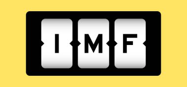 Sarı arkaplanlı slot pankartıyla IMF (Uluslararası Para Fonu 'nun kısaltması) siyah renk