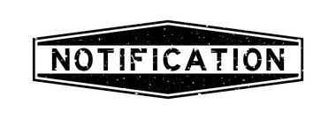 Grunge siyah bildirim sözcüğü altıgen lastik mühür beyaz arka planda