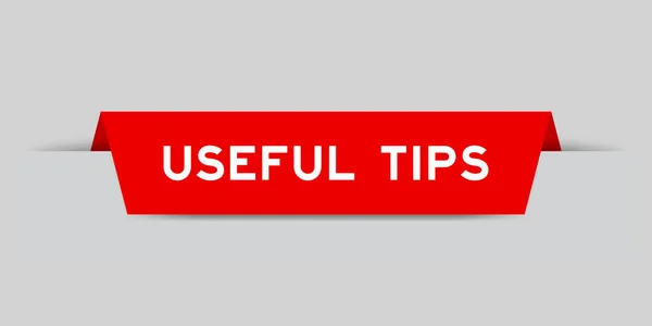 Rote Farbe Eingefügt Etikett Mit Wort Nützliche Tipps Auf Grauem — Stockvektor