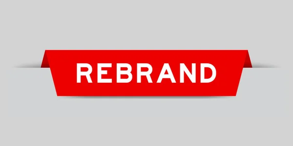 Etiqueta Color Rojo Insertada Con Palabra Rebrand Sobre Fondo Gris — Vector de stock